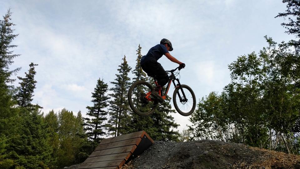 Biker jumping at Seward Bike Park